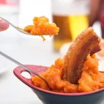 depositphotos_528382304-stock-photo-patatas-machaconas-mashed-potatoes-with
